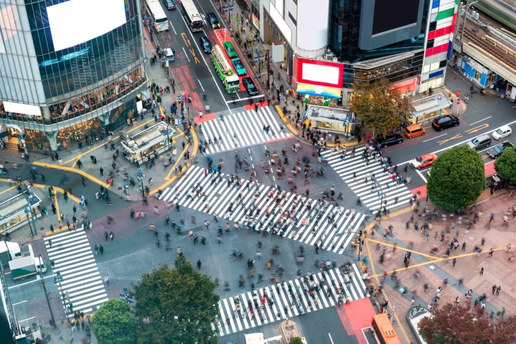 aerial-view-of-pedestrians-walking-across-with-cro-2026-01-09-07-45-45-utc (1)