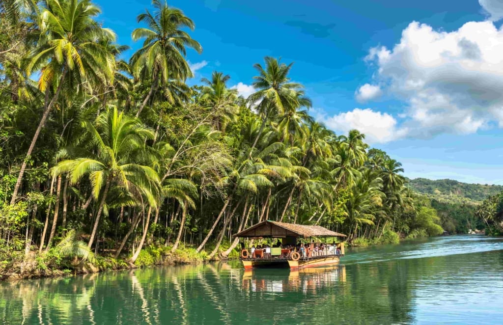 Loboc Floating Restaurant Rejser til Filippinerne - Lobac - Chocolate Hills Tour